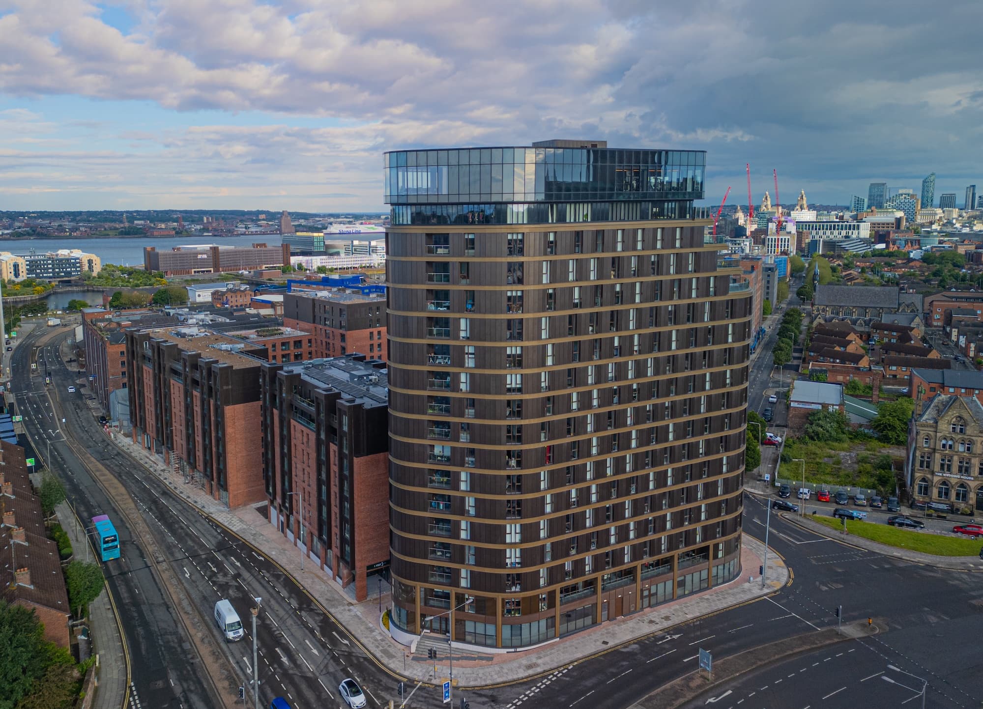 Parliament Square in Liverpool's Baltic Triangle. Jayde Spa sits on the 17th floor — the curved glass crown at the top.